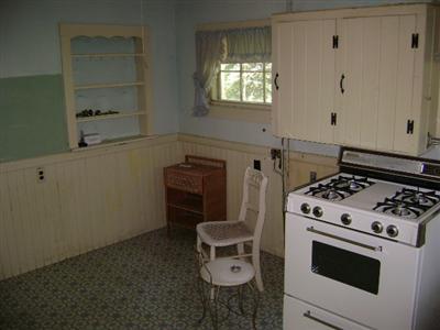 68 Nickerson Road Cotuit, MA 02635 - Photo 3 of 12 a stove top oven sitting inside of a kitchen