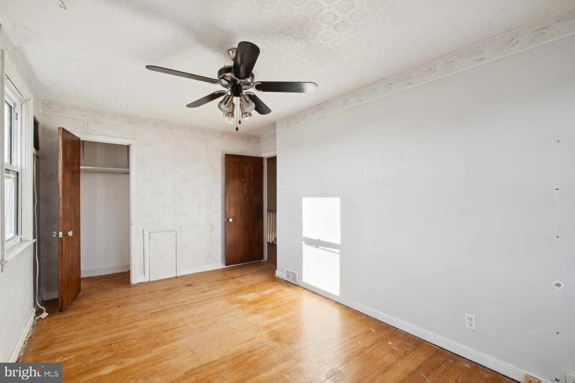 3051 Gilham Street Philadelphia, PA 19149 - Photo 4 of 10 a view of empty room with a ceiling fan