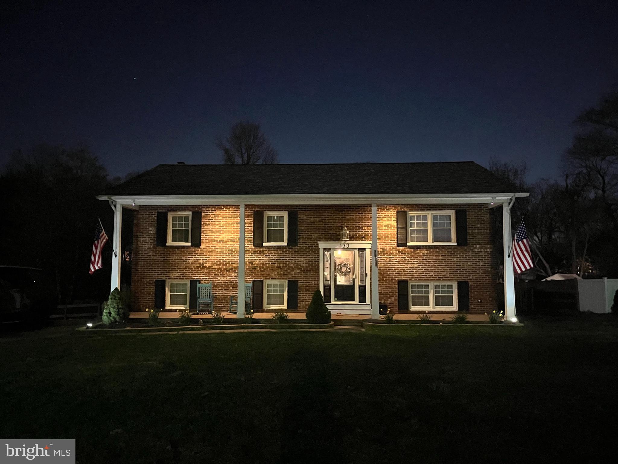 133 Circle Road Pasadena, MD 21122 - Photo 4 of 44 Front of the home in the evening.