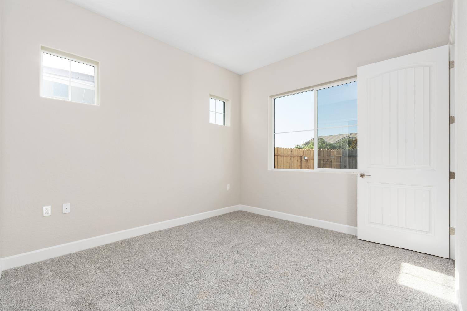 272 Peters Road Madera, CA 93636 - Photo 12 of 25 an empty room with a window