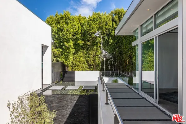 a view of swimming pool with outdoor seating
