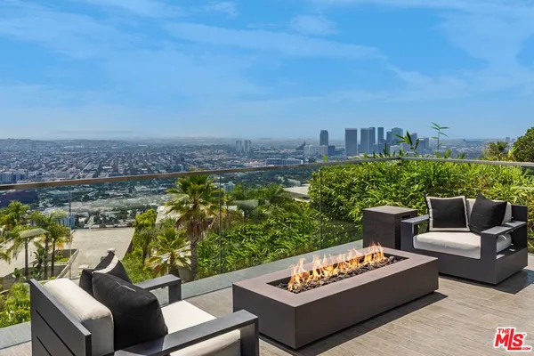 a view of a city with tall buildings in the background