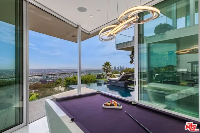 a view of an outside dining space with furniture
