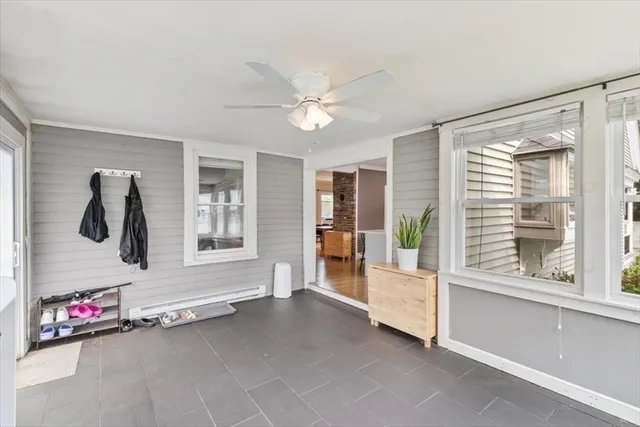 a view of an empty room with a window