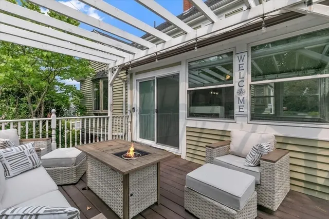 a spacious bedroom with a bed and lamp