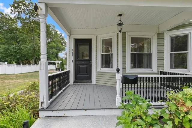 a view of a house with porch and wooden floor