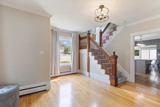 a view of entryway with wooden floor