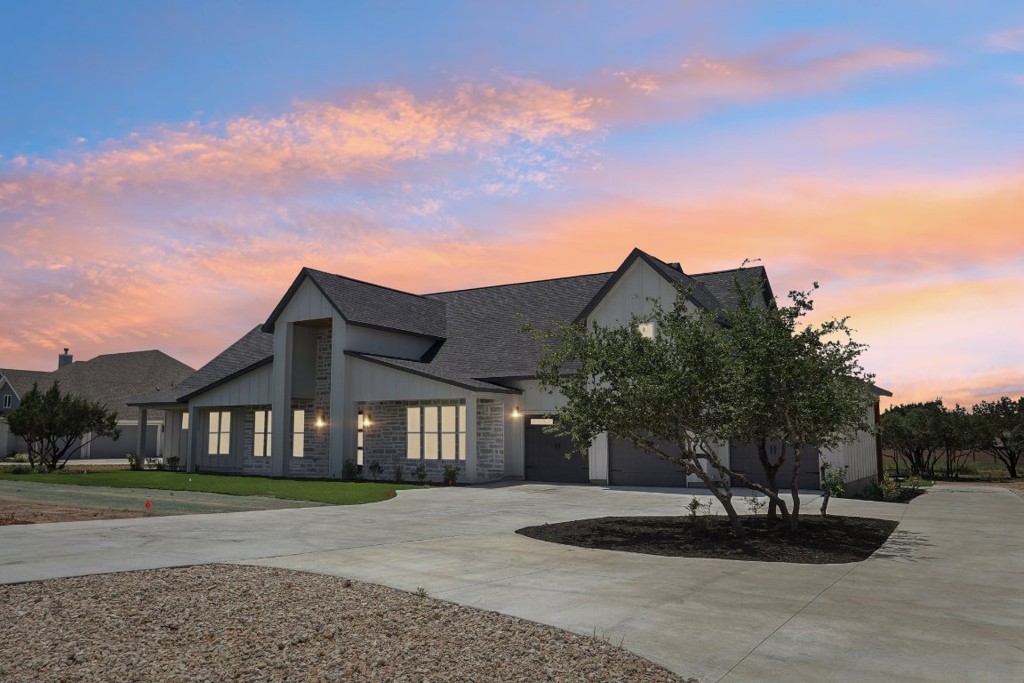 755 Rolling Hills Road Liberty Hill, TX 78642 - Photo 1 of 1 a front view of a house with a yard