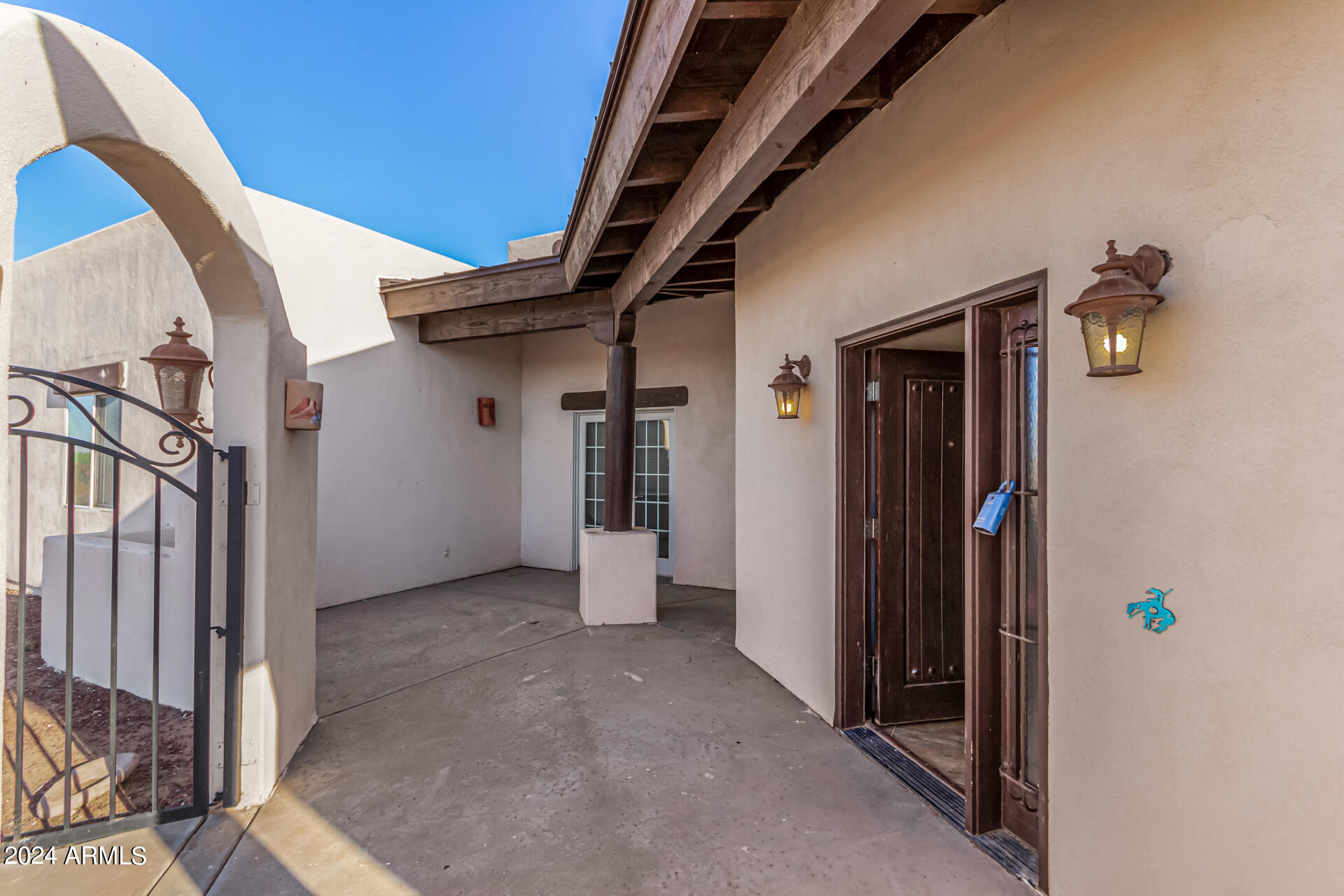 10589 West Harmon Road Eloy, AZ 85131 - Photo 14 of 82 a view of an entryway with a white door