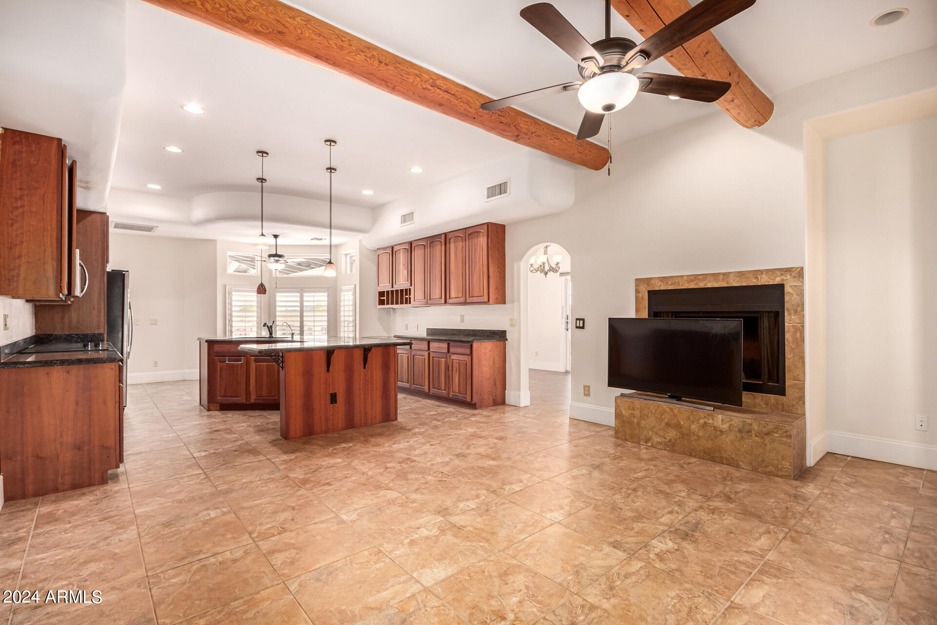10589 West Harmon Road Eloy, AZ 85131 - Photo 21 of 82 a large kitchen with cabinets and stainless steel appliances