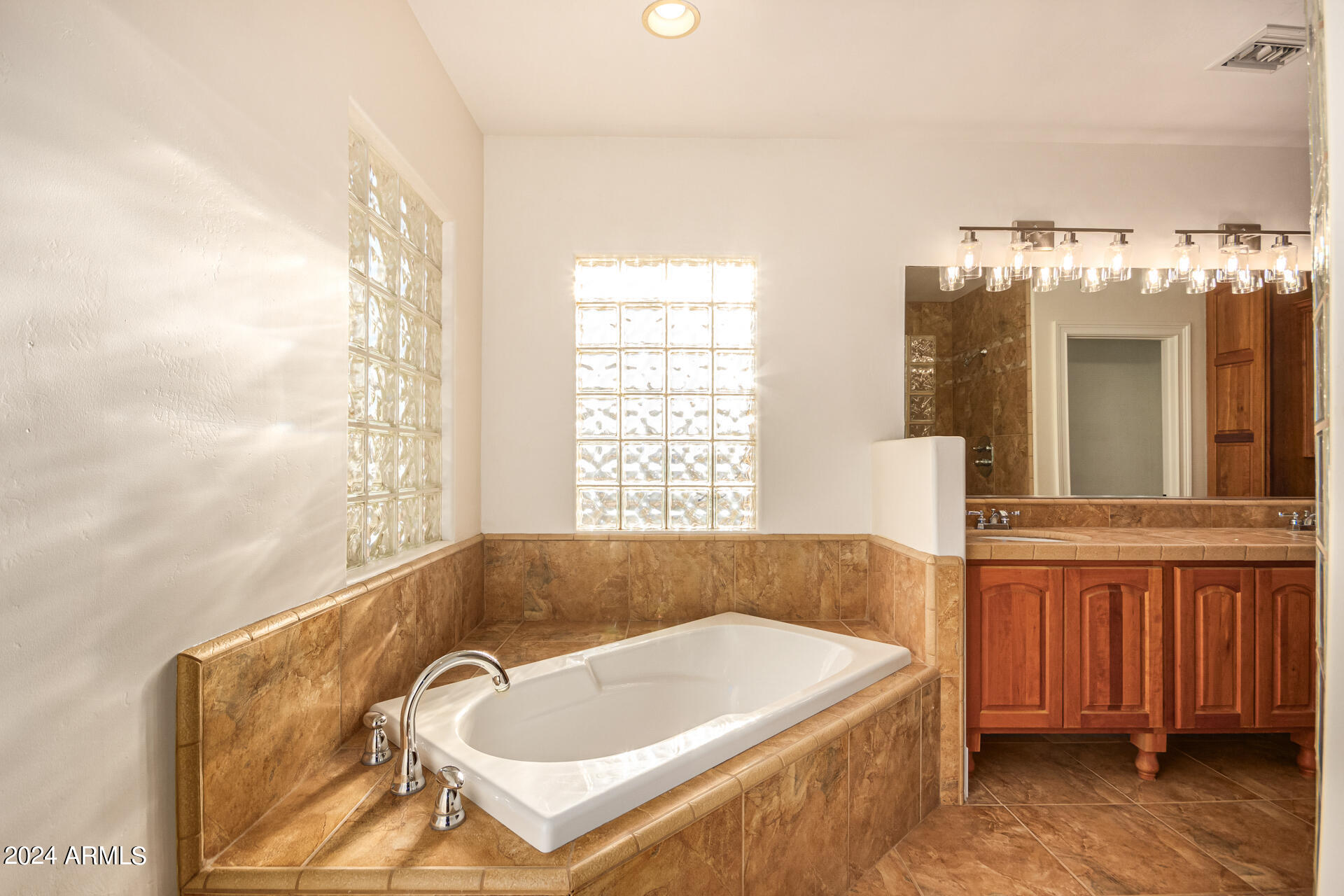10589 West Harmon Road Eloy, AZ 85131 - Photo 40 of 82 a spacious bathroom with sink shower and bathtub