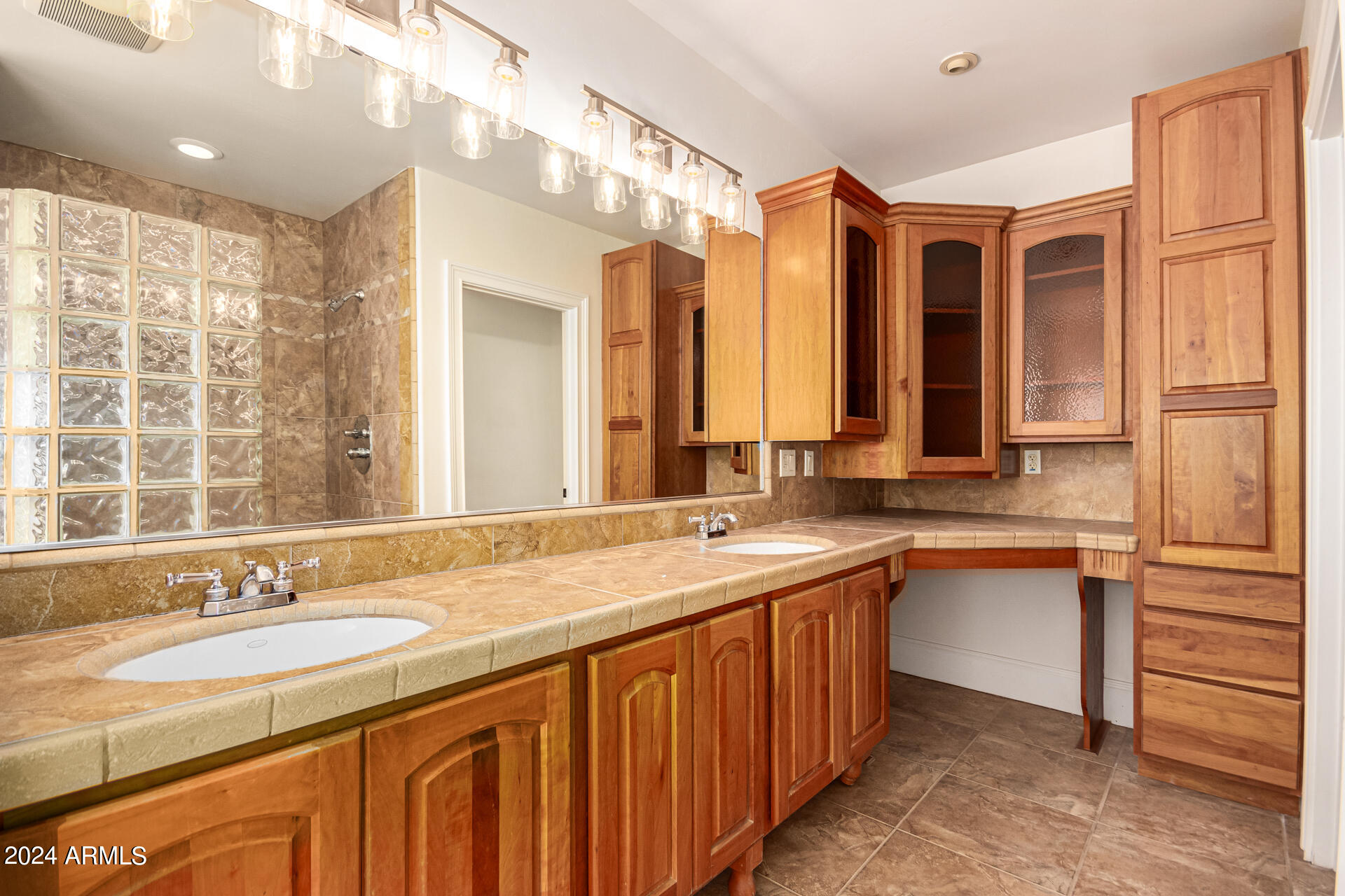 10589 West Harmon Road Eloy, AZ 85131 - Photo 41 of 82 a bathroom with a sink double vanity and a mirror