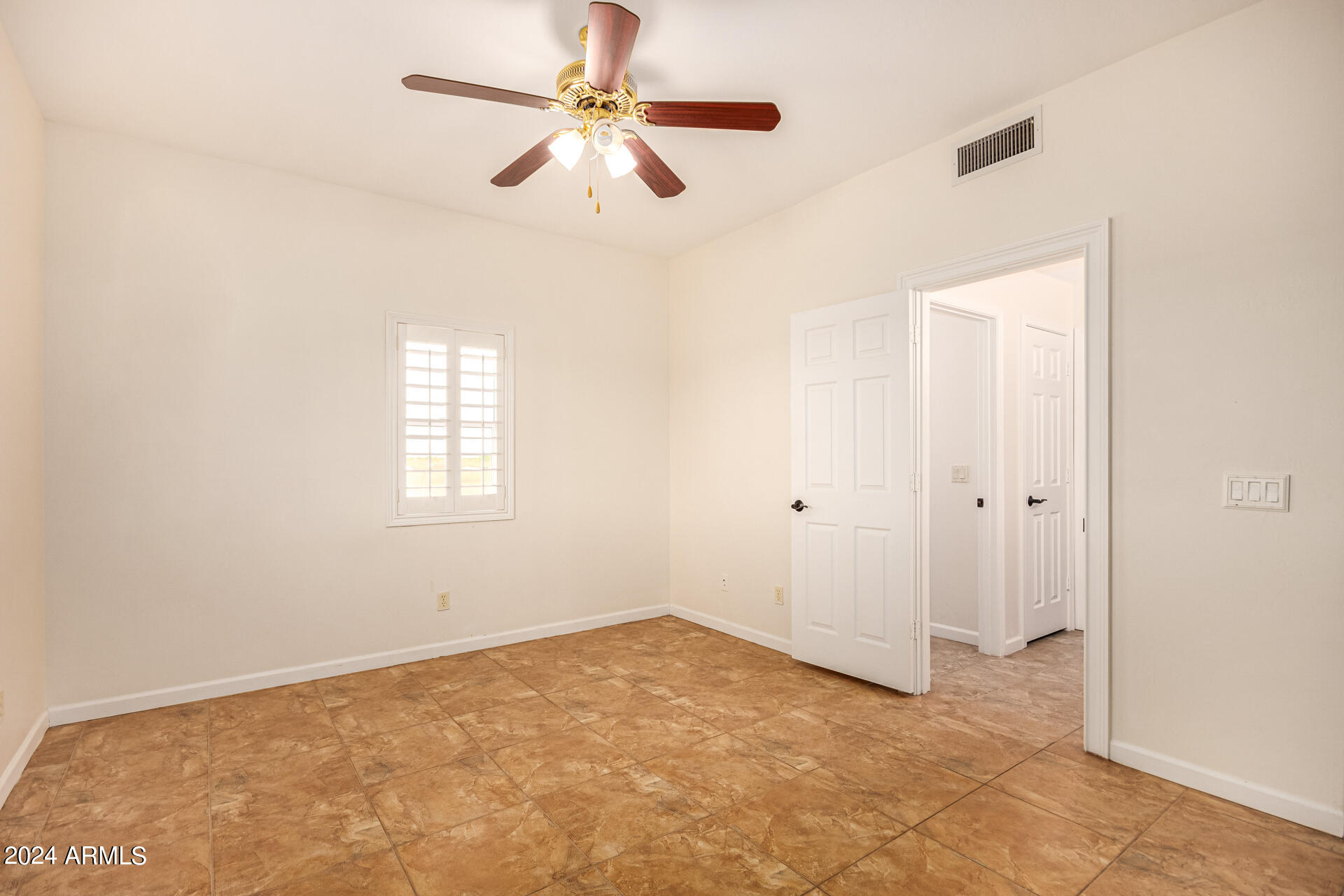 10589 West Harmon Road Eloy, AZ 85131 - Photo 48 of 82 a view of an empty room with a window