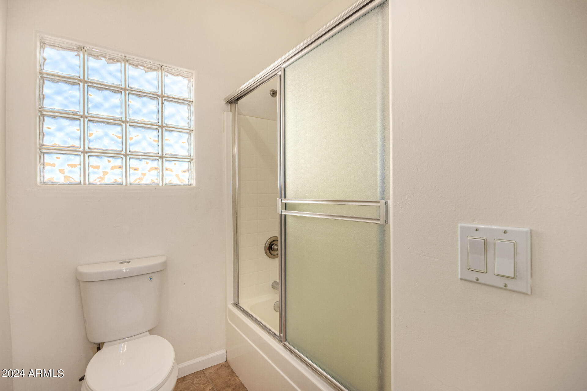 10589 West Harmon Road Eloy, AZ 85131 - Photo 50 of 82 a bathroom with a toilet and a shower