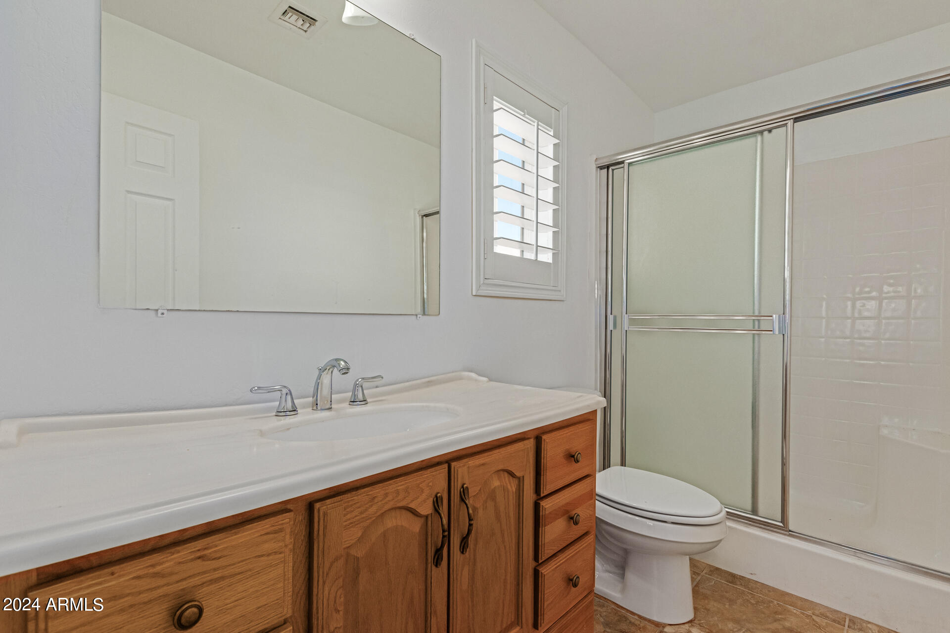 10589 West Harmon Road Eloy, AZ 85131 - Photo 69 of 82 a bathroom with a sink a toilet and shower