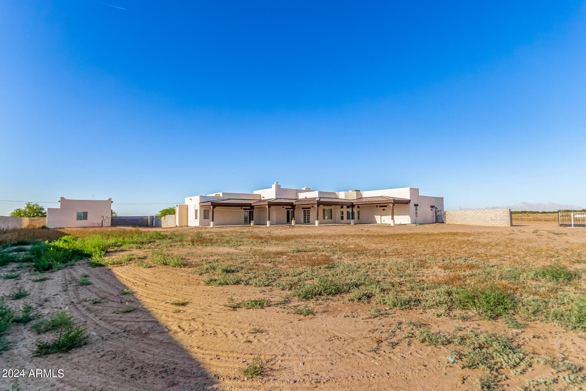 10589 West Harmon Road Eloy, AZ 85131 - Photo 71 of 82 a view of a large building with beach in front of it