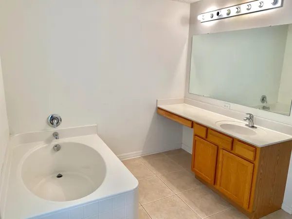 a bathroom with a sink and a bathtub