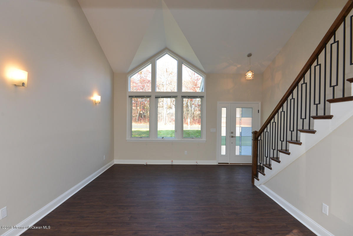 93 Friendship Road Howell, NJ 07731 - Photo 12 of 51 a view of an entryway with wooden floor