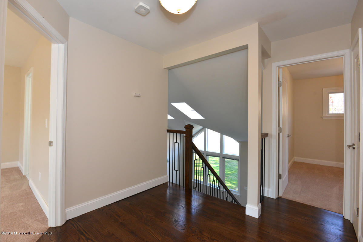 93 Friendship Road Howell, NJ 07731 - Photo 22 of 51 a view of entryway with wooden floor