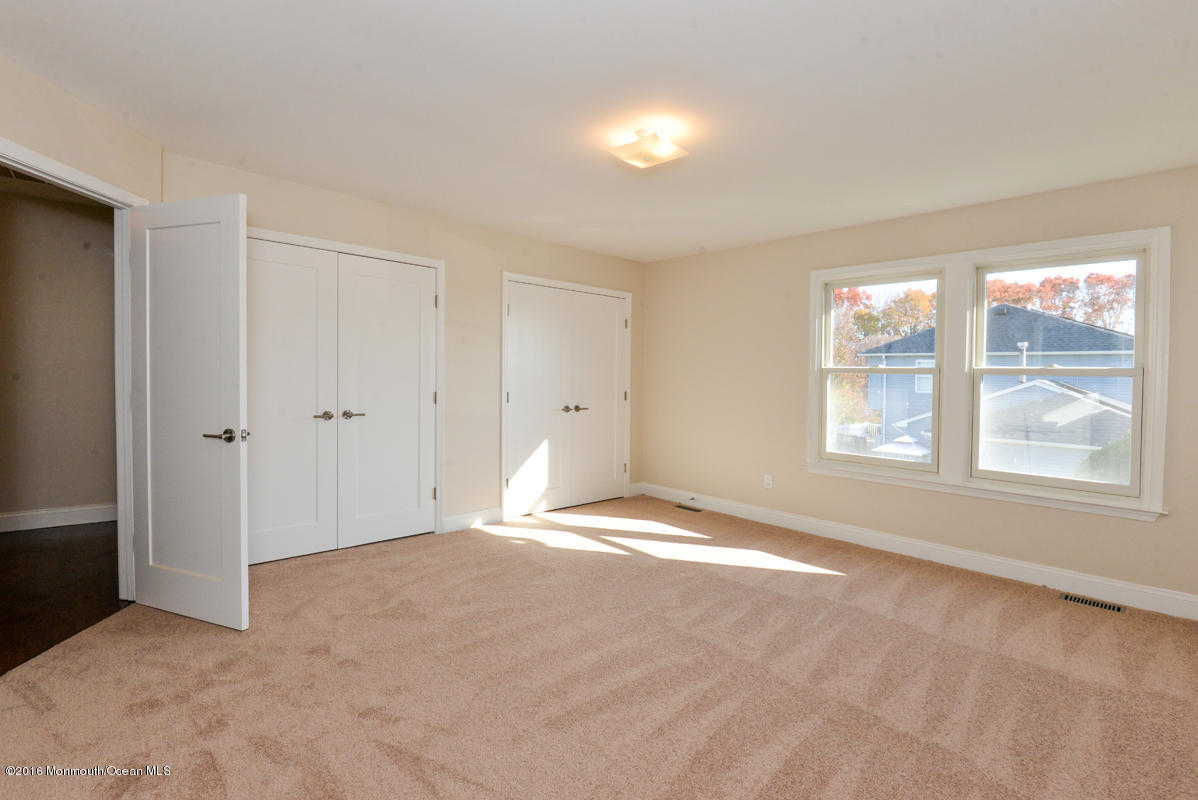 93 Friendship Road Howell, NJ 07731 - Photo 28 of 51 a view of an empty room with a window