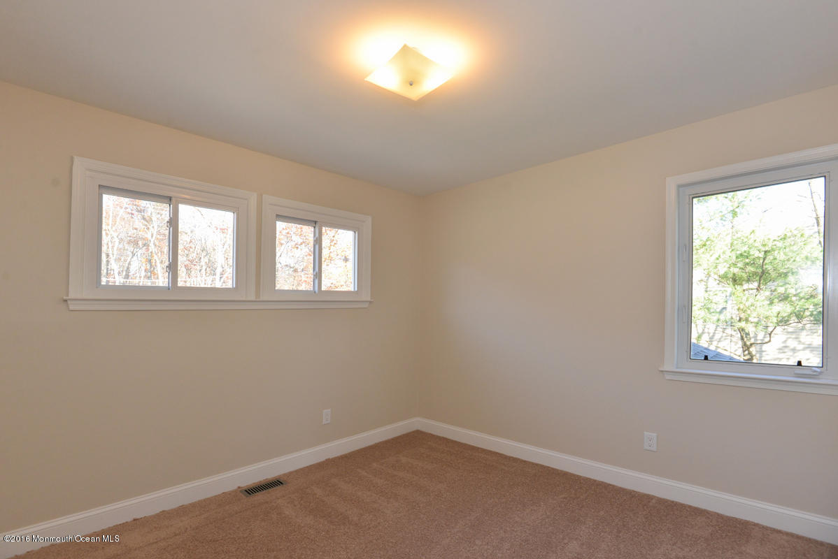 93 Friendship Road Howell, NJ 07731 - Photo 34 of 51 an empty room with a window