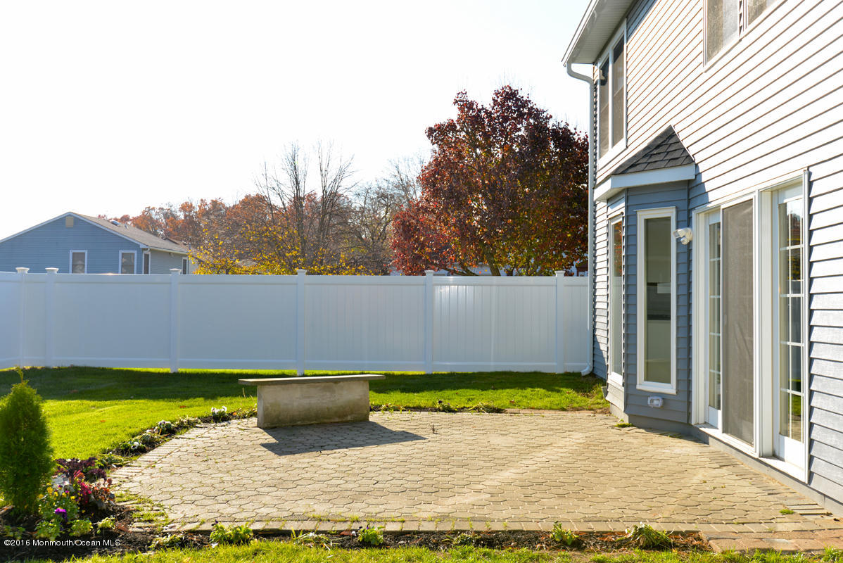 93 Friendship Road Howell, NJ 07731 - Photo 43 of 51 a view of a back yard of the house