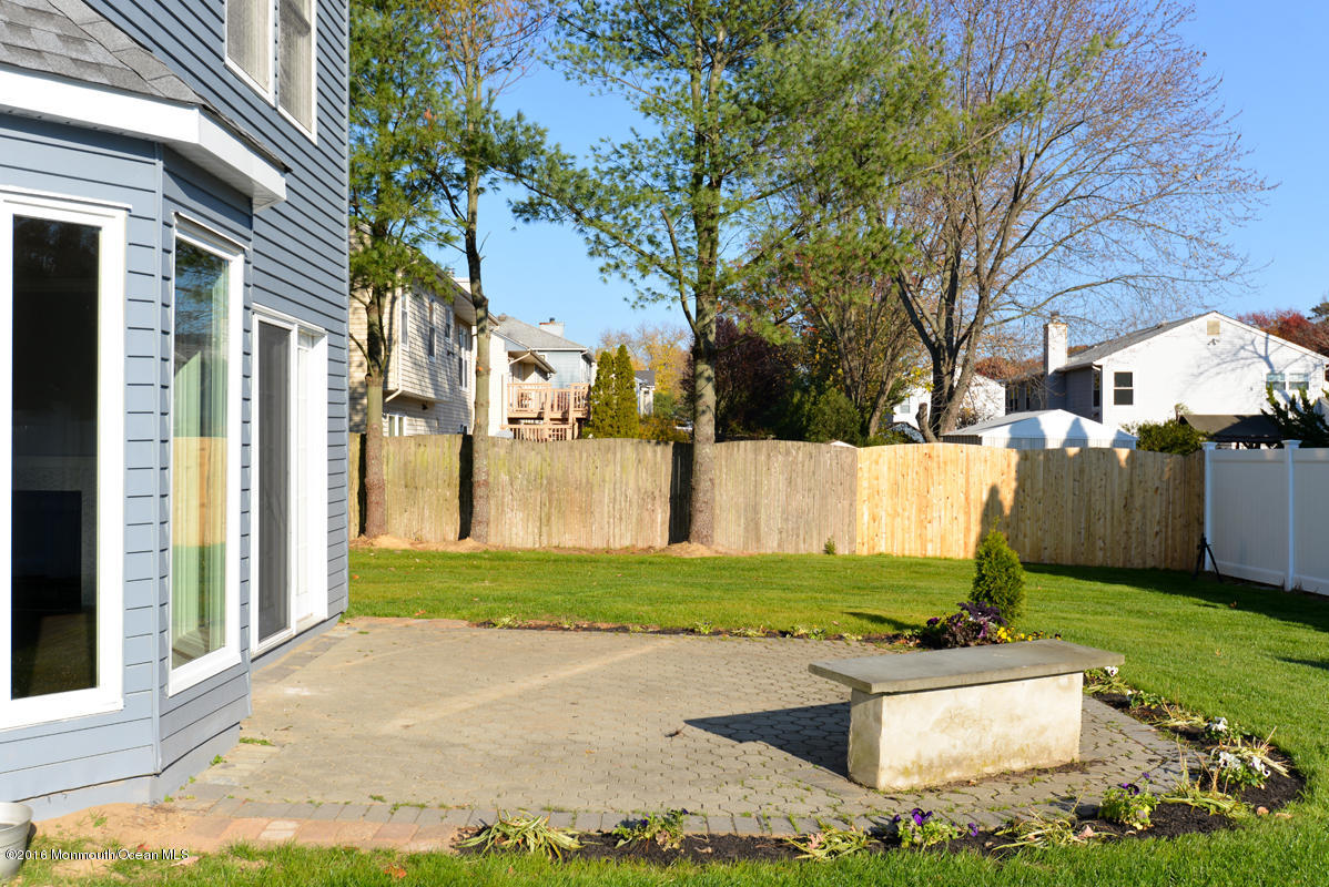 93 Friendship Road Howell, NJ 07731 - Photo 44 of 51 a view of a backyard with large trees