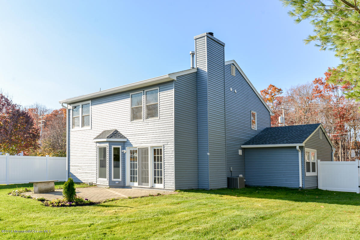 93 Friendship Road Howell, NJ 07731 - Photo 51 of 51 a front view of a house with a yard