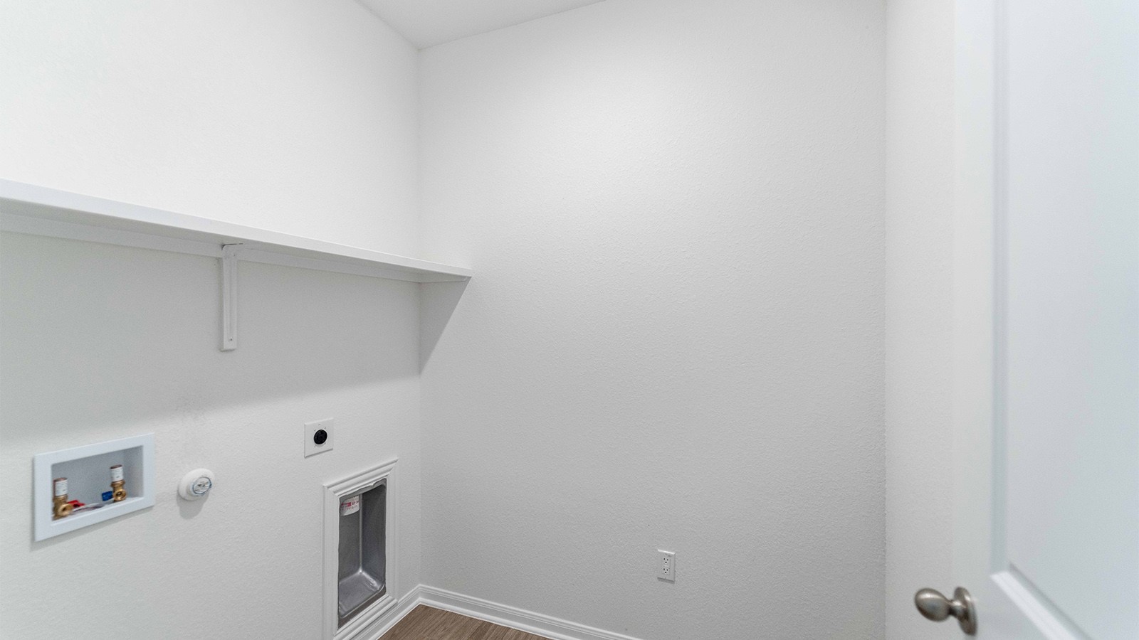 13613 Endless Narrow Lane Elgin, TX 78621 - Photo 11 of 16 a view of utility room