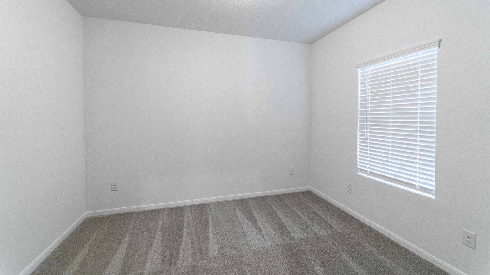 13613 Endless Narrow Lane Elgin, TX 78621 - Photo 12 of 16 a view of an empty room with a window