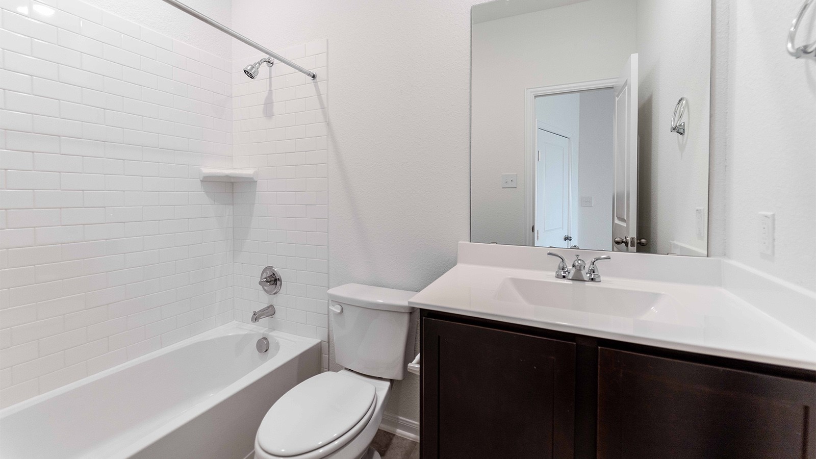 13613 Endless Narrow Lane Elgin, TX 78621 - Photo 13 of 16 a bathroom with a sink a toilet and shower