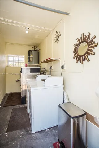 a view of a palm plant from a balcony