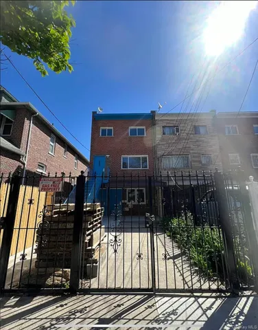 a view of a balcony with next to a yard