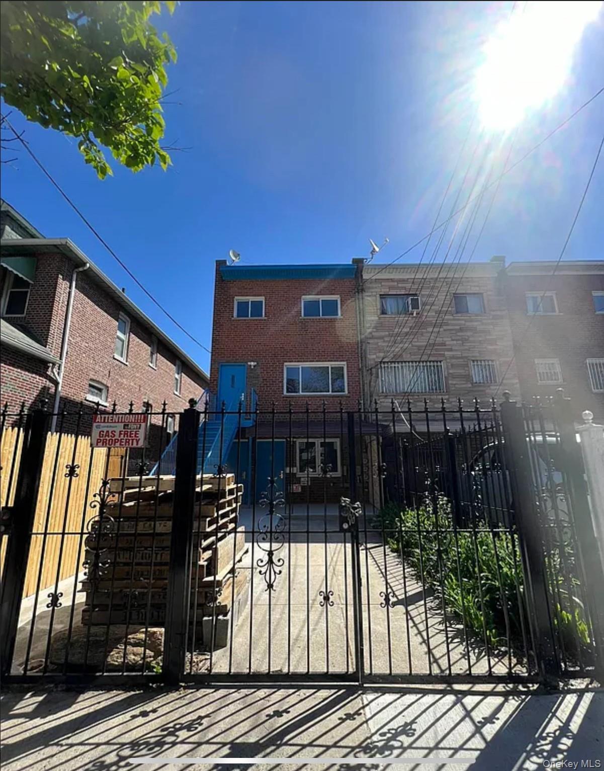718 Rosedale Avenue Bronx, NY 10473 - Photo 9 of 9 Gate with a fenced front yard