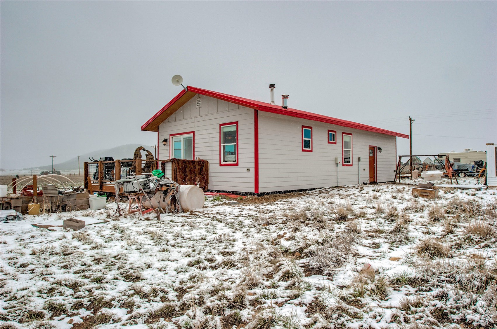 1620 Trout Road Fairplay, CO 80440 - Photo 27 of 31 Snow covered property with a wooden deck