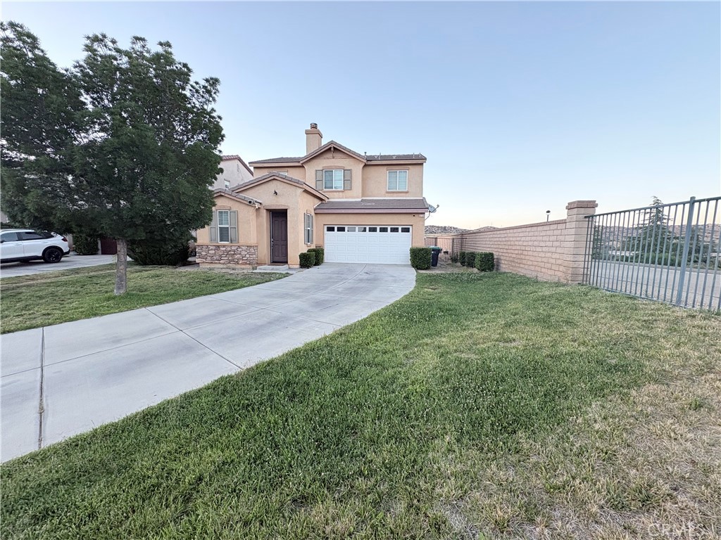2729 Hornbeam Road Palmdale, CA 93551 - Photo 32 of 35 a view of a house with a big yard and large trees