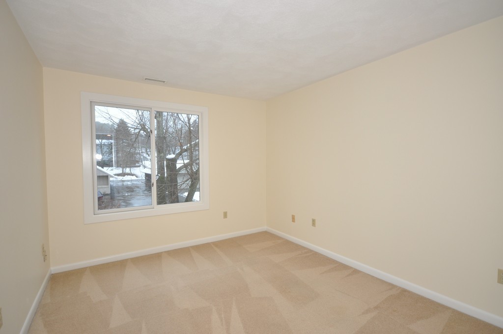 29 Concord Greene, Unit 4 Concord, MA 01742 - Photo 13 of 23 an empty room with a window