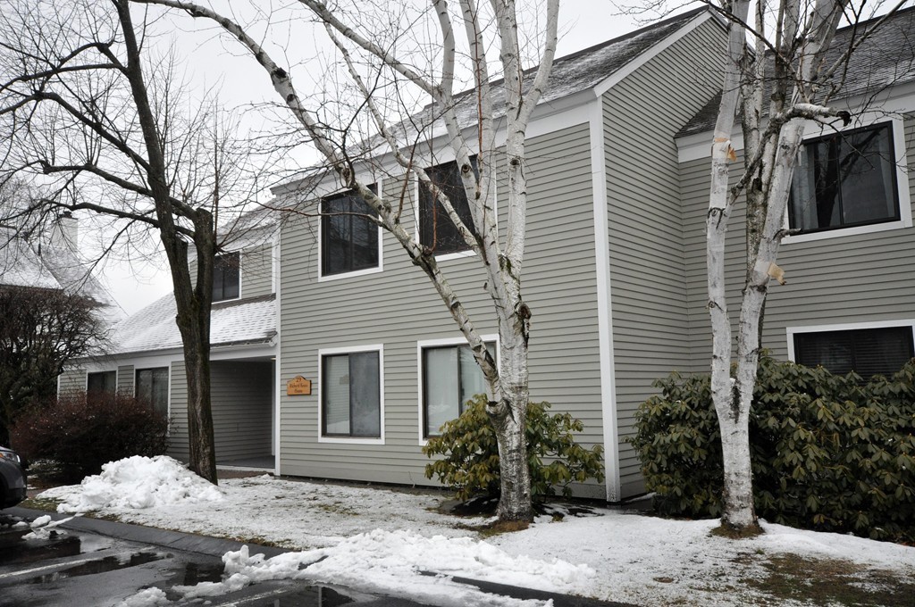 29 Concord Greene, Unit 4 Concord, MA 01742 - Photo 2 of 23 a front view of a house with a yard