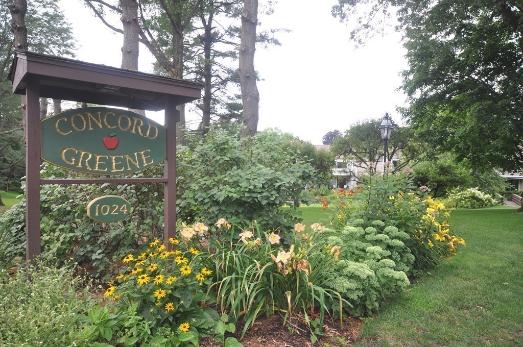 29 Concord Greene, Unit 4 Concord, MA 01742 - Photo 23 of 23 a sign on the side of a road