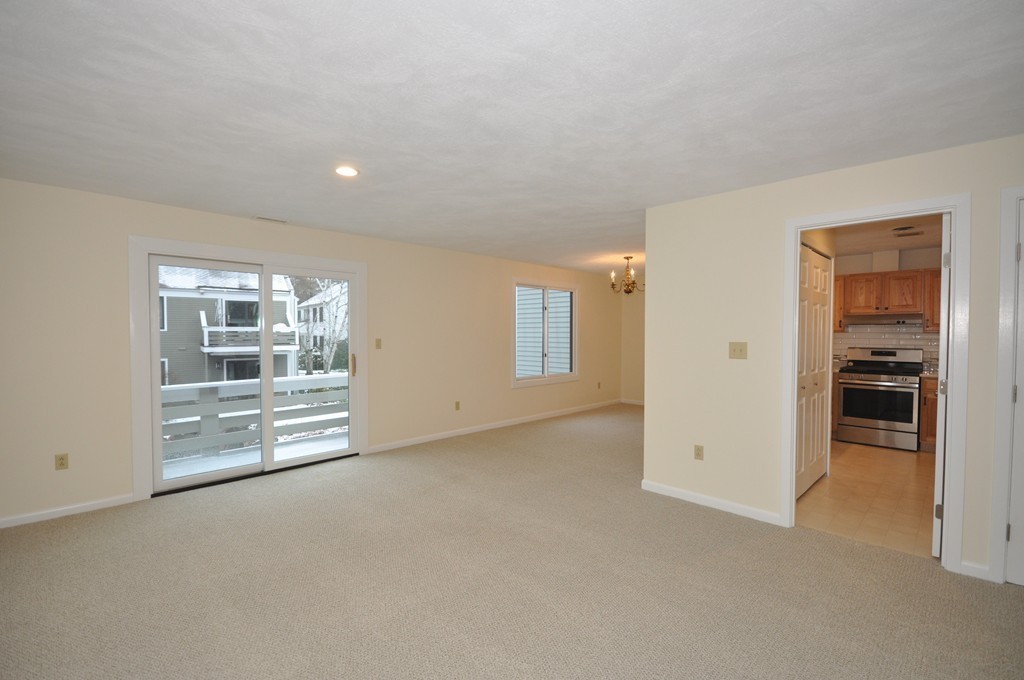 29 Concord Greene, Unit 4 Concord, MA 01742 - Photo 5 of 23 a view of an empty room with a window