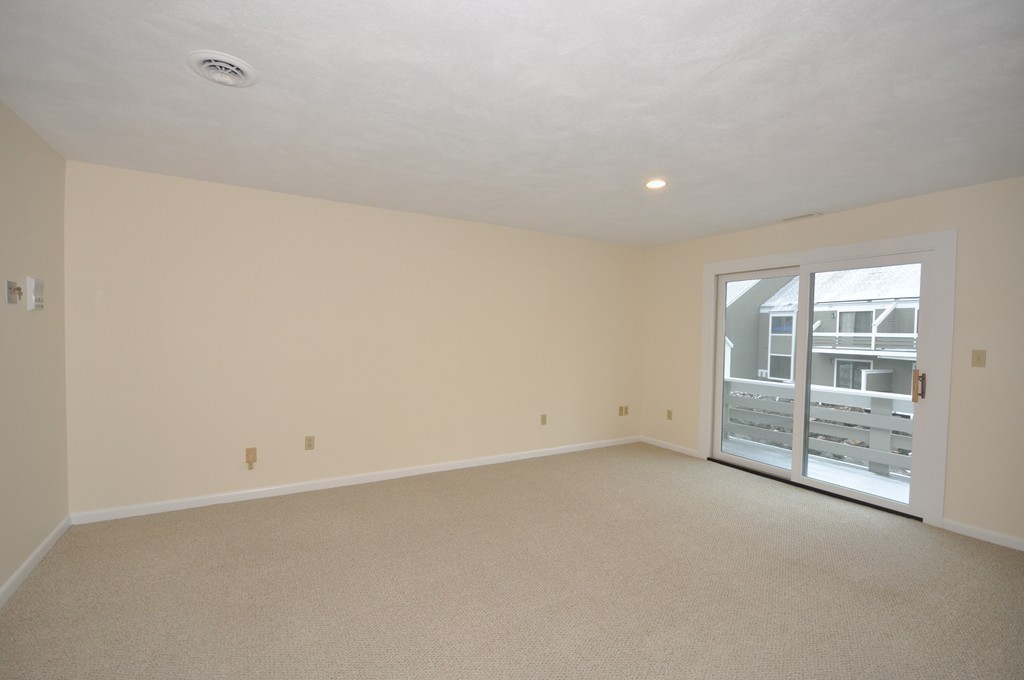 29 Concord Greene, Unit 4 Concord, MA 01742 - Photo 7 of 23 an empty room with windows