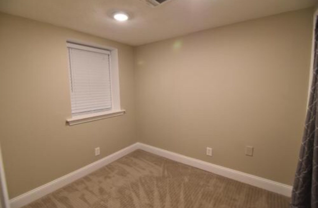 84 Gordon Street, Unit 206 Boston, MA 02135 - Photo 11 of 15 an empty room with a window