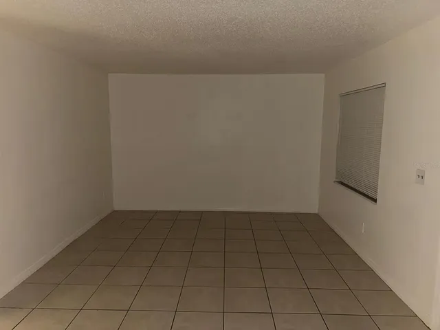 an empty room with white door