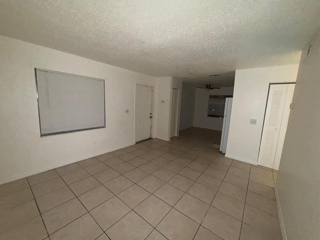 719 Michigan Court, Unit 3 St. Cloud, FL 34769 - Photo 6 of 17 a view of an empty room