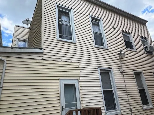 a car parked in front of a house
