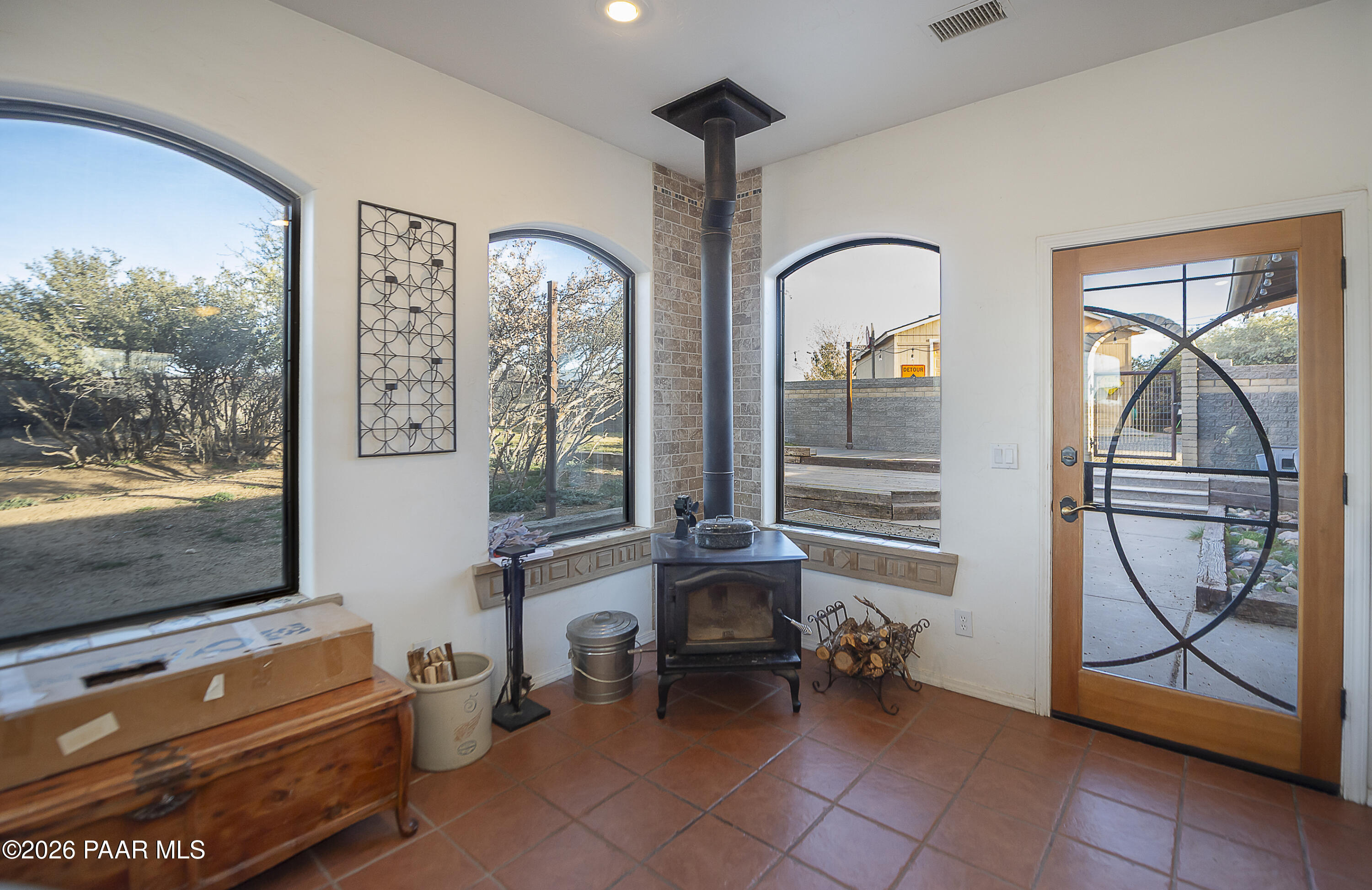 6565 Musgrove Road Skull Valley, AZ 86338 - Photo 18 of 65 a room with multiple dryer and windows