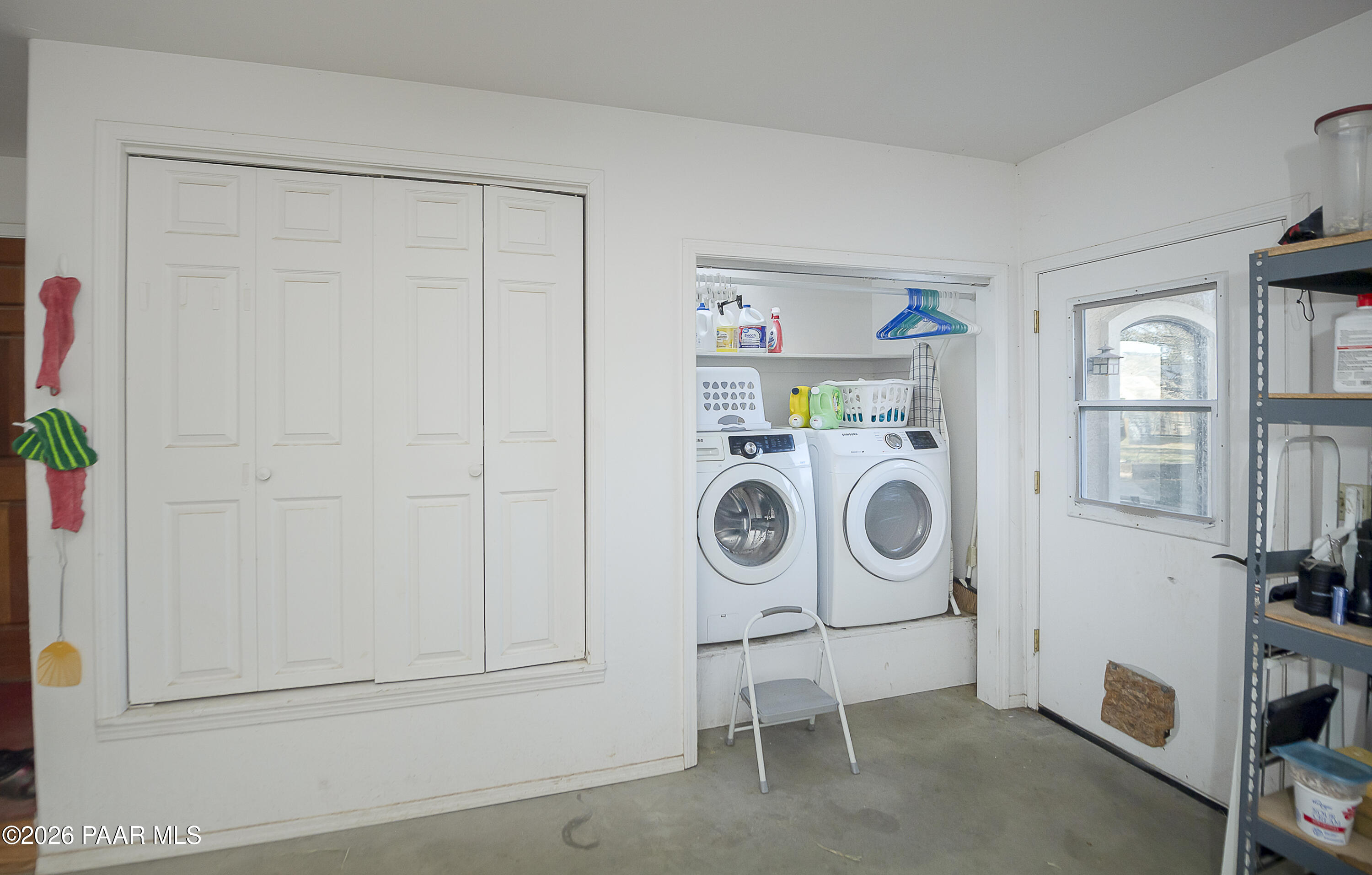 6565 Musgrove Road Skull Valley, AZ 86338 - Photo 36 of 65 a utility room with dryer and washer