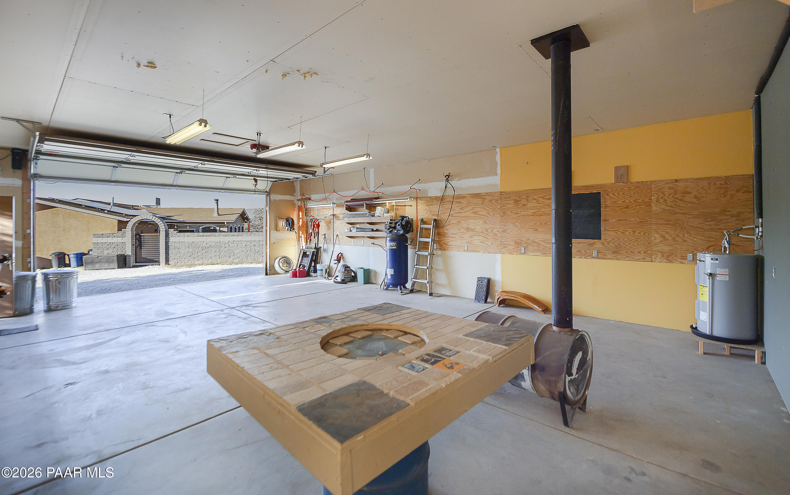 6565 Musgrove Road Skull Valley, AZ 86338 - Photo 49 of 65 a view of a living room and kitchen