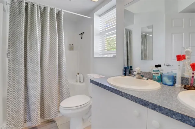 a view of a living room and a window