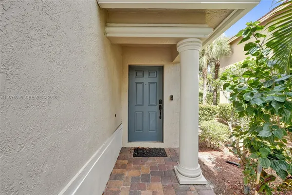 a house view with a garden space